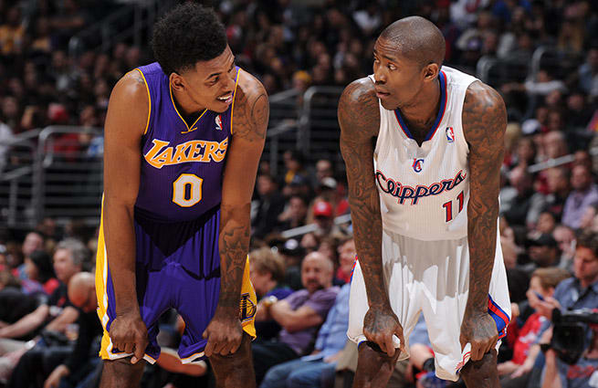 Trading places: The lowly Lakers are stuck in the Western cellar, while the Clips look like contenders.